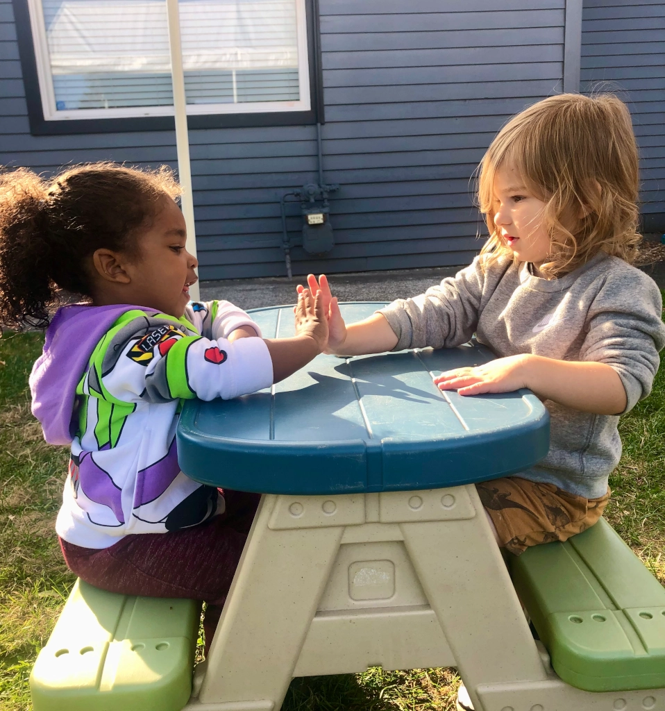 Children playing in a nurturing bilingual environment